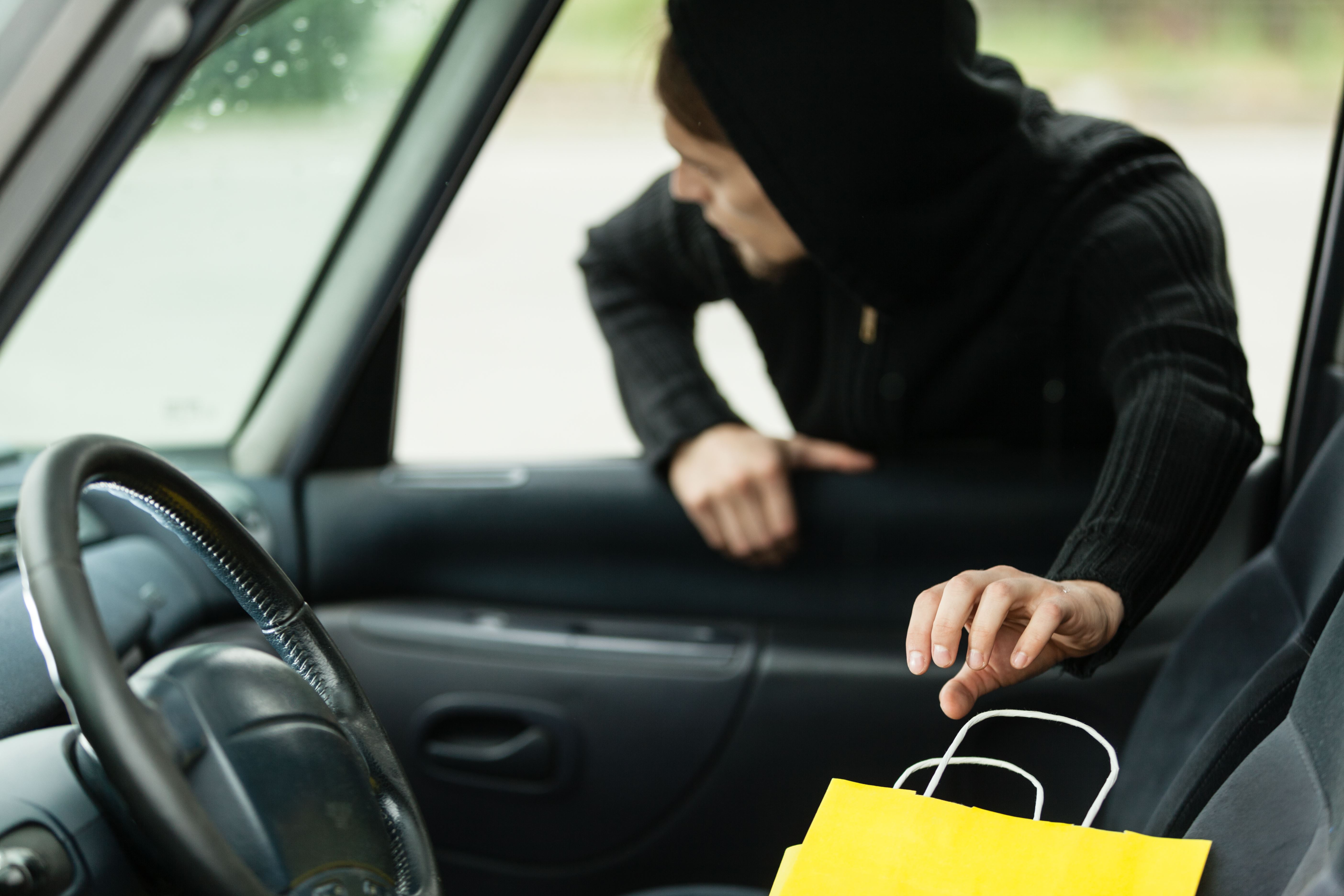 Man stealing a shopping bag - shoplifting and depression