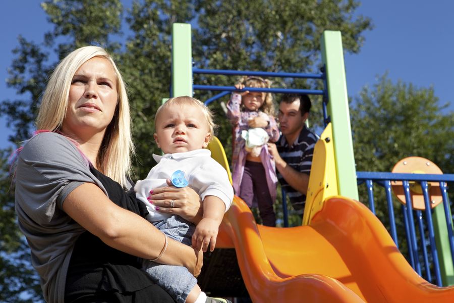 children and parents at the park